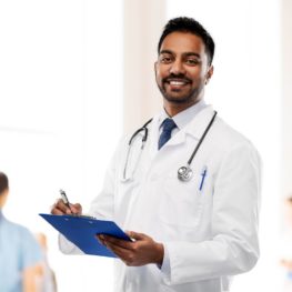 Asian doctor smiling Asian doctor smiling