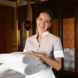 young house keeper smiling young house keeper smiling